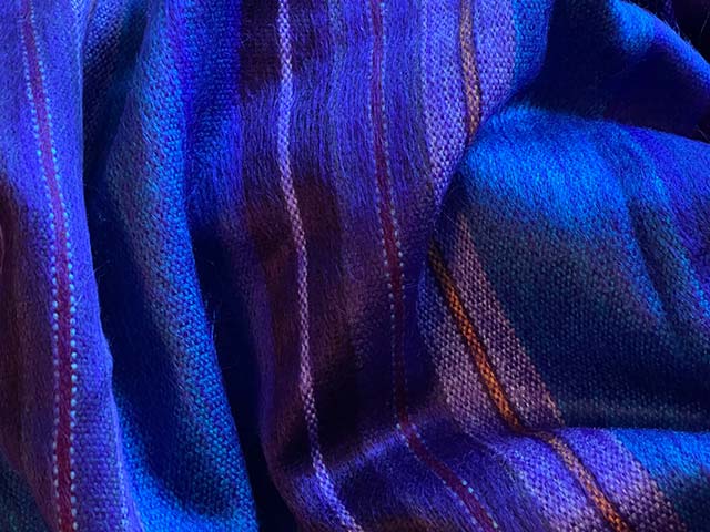 Deep purple blanket and throw detail